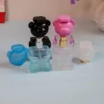 عطر أطفال شكل دب – أزرق/زهري برائحة لطيفة وثبات خفيف | متجر ببلاش